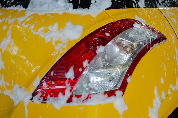 Car wash with foam in car wash - Fotoğraf, Görsel