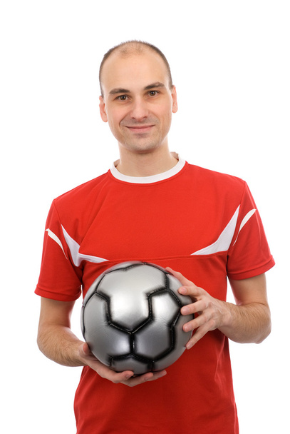 Young man holding a soccer ball - Φωτογραφία, εικόνα