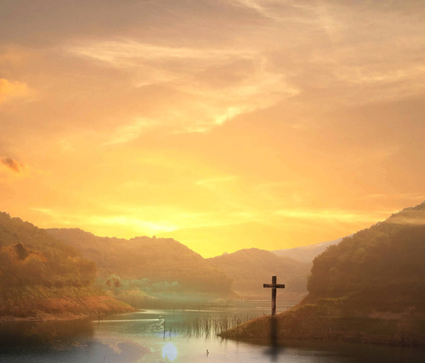 Easter concept:Silhouette cross on Calvary mountain sunset background.  - Photo, Image