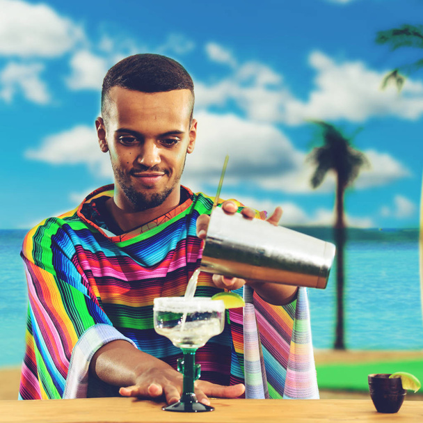 Selective focus on handsome, smiling Mexican bartender standing  - 写真・画像