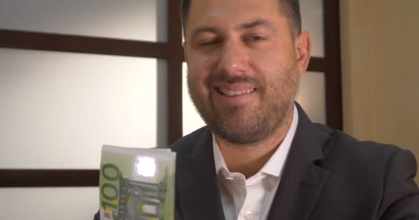 Successful businessman counts money - Footage, Video