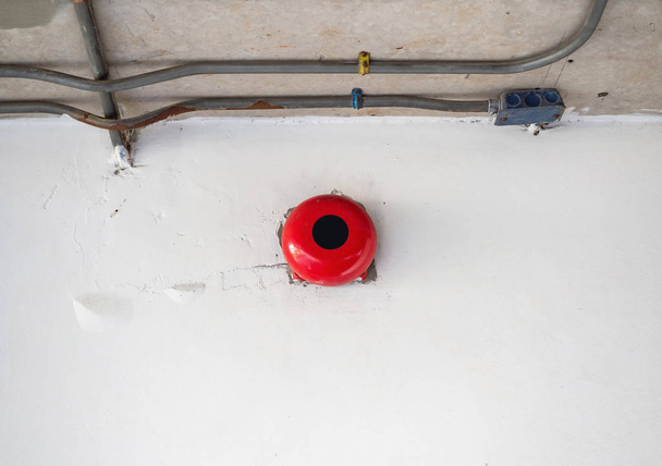 Fire alarm bell on the concrete wall - Photo, Image
