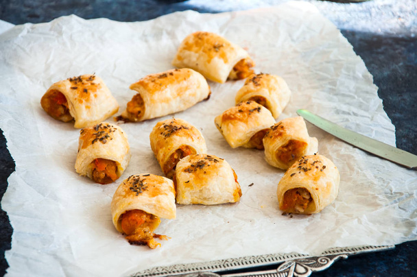 Puff pastry rolls with pumpkin and cheese filling. Close up. - Фото, изображение