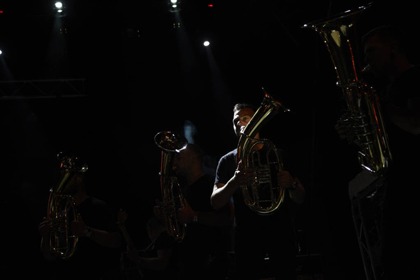 NOVI SAD, SERBIA - JULY 8, 2017: Man with a waner tuba as member of trumpet band on Fusion Stage at Exit music festival on Petrovaradin fortress Novi Sad, Serbia on July 8, 2017 - Valokuva, kuva