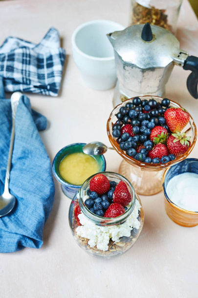 vase with fresh berries, product set for breakfast - Photo, image