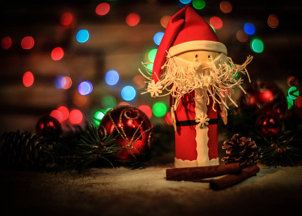 toy Santa Claus on a Christmas background - Фото, зображення
