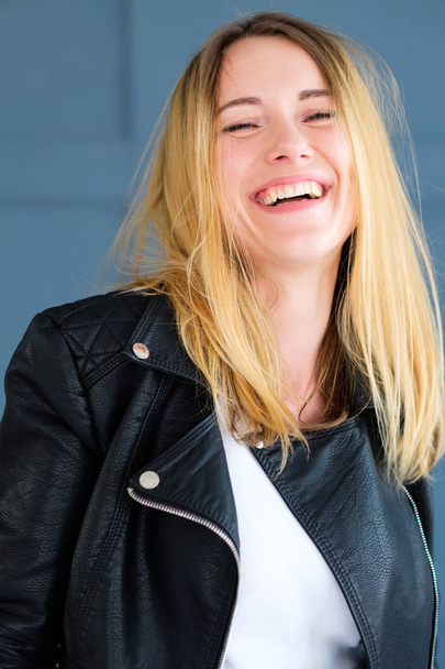 happy thrilled girl beaming smile rocker jacket - Fotografie, Obrázek