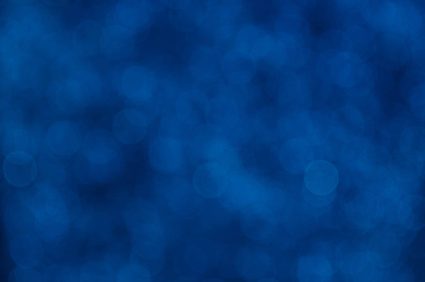Dark blue abstract bokeh background. - Photo, Image
