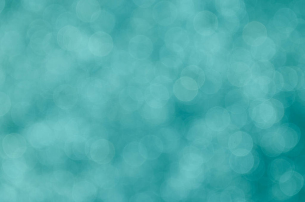 Teal abstract bokeh background. - Фото, изображение