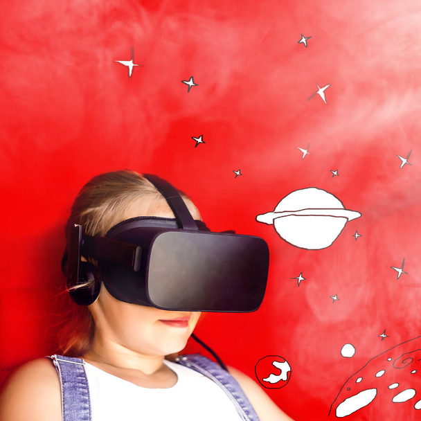girl in virtual glasses. looks at the cosmos and the galaxy. real atmosphere - Fotó, kép