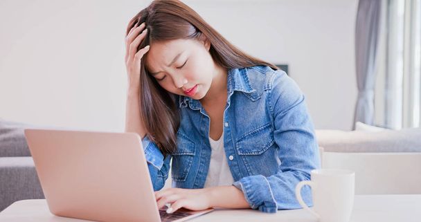 woman using  computer  and feeling  confused at home - 写真・画像