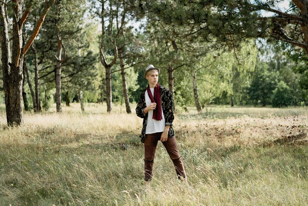 stylish young man posing outdoors  - Fotó, kép