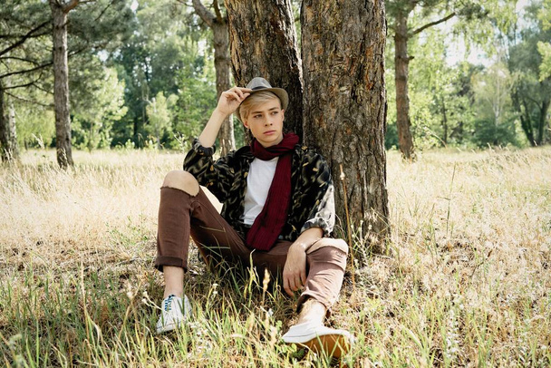 stylish young man posing outdoors  - Foto, immagini