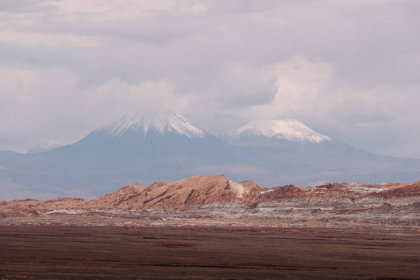 Two volcanoes in the desert - Фото, изображение