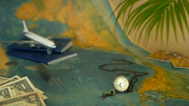 Время путешествовать. Тема отпуска с картой мира, синим паспортом и самолетом. Подготовка к празднику, путешествие
 - Кадры, видео