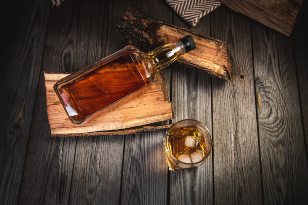 Glass and bottle of bourbon whiskey - Zdjęcie, obraz