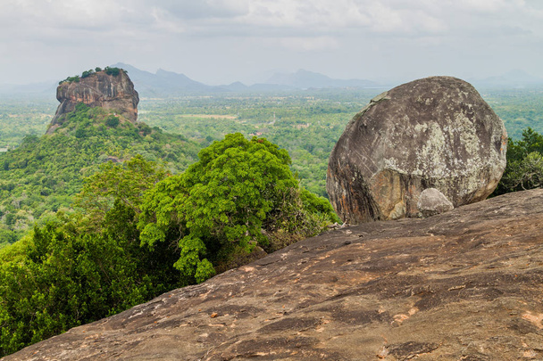 View of Sigiriya Lion Rock from nearby Pidurangala Rock, Sri Lanka - Foto, immagini