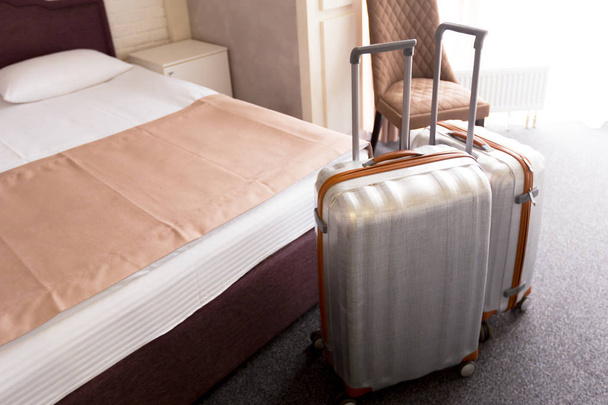 Suitcase or luggage bag in a modern hotel room - Photo, Image