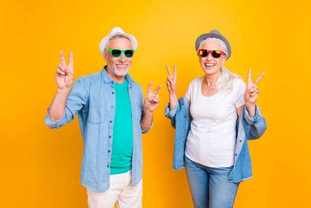 Happiness friendship denim style stylish trend cool hipster concept. Photo portrait of two funky swag mad excited with toothy smile in white clothes partners making victory symbol isolated background - Photo, image