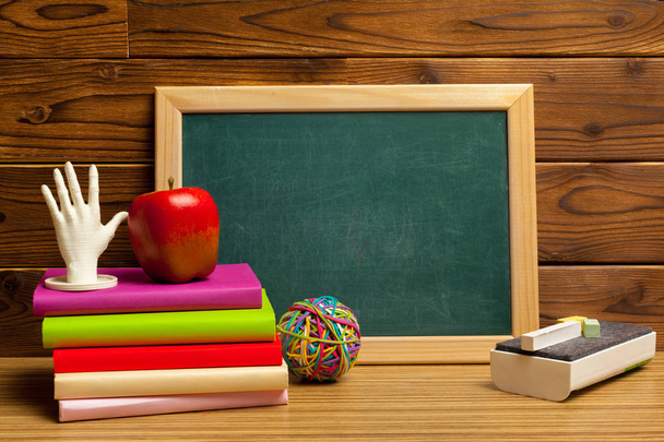 Back to school background with books and blackboard - Photo, image