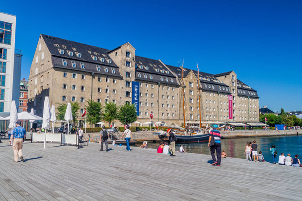 COPENHAGEN, DENMARK - AUGUST 26, 2016: View of Admiral Hotel on the waterfront in the port of Copenhagen, Denmark - Fotó, kép