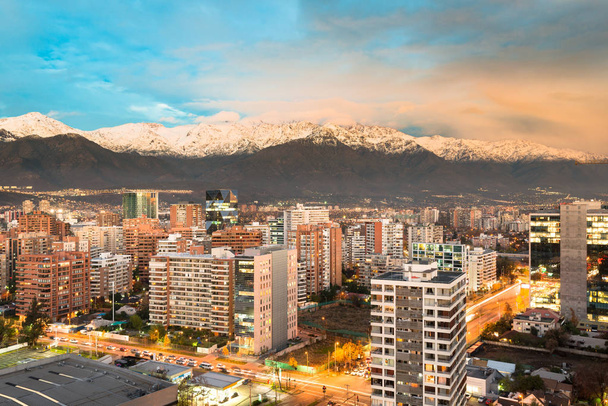 Apartment buidings in the wealhty district of Las Condes with The Andes mountain Range in the back, Santiago de Chile - Photo, Image