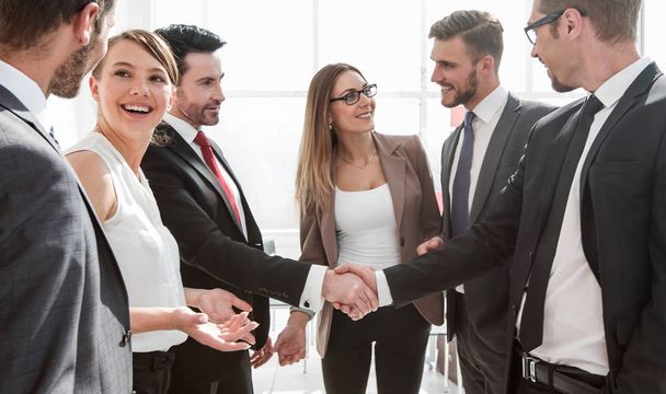 Business handshake in a modern office - Φωτογραφία, εικόνα