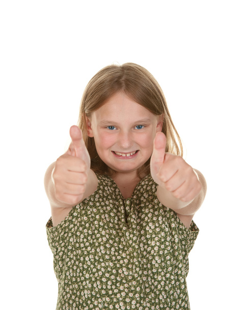 Young girl gives two thumbs up - Foto, Imagen