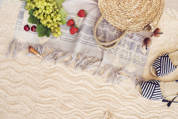 Beach towel on sandy floor - Photo, Image