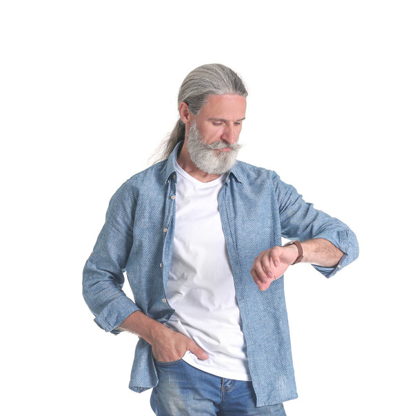 Handsome bearded mature man on white background - Photo, image