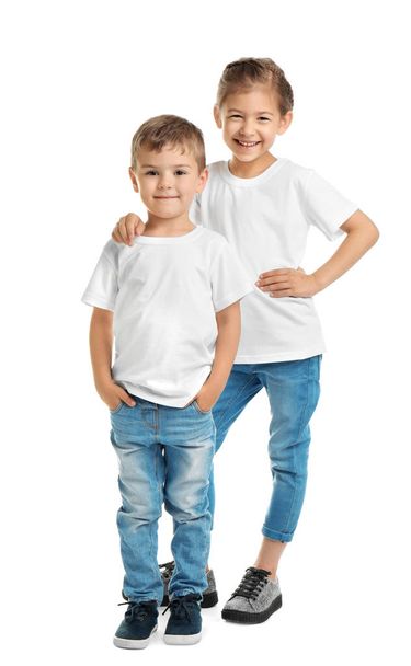 Little kids in t-shirts on white background. Mockup for design - Fotó, kép