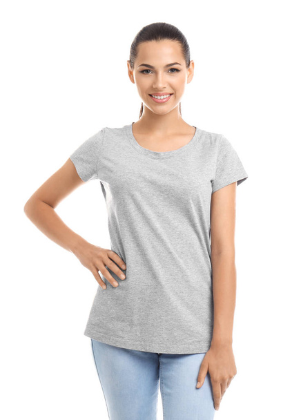 Young woman in t-shirt on white background. Mockup for design - Foto, immagini