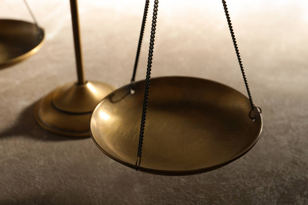 Scales of justice on table, closeup. Law concept - Фото, изображение