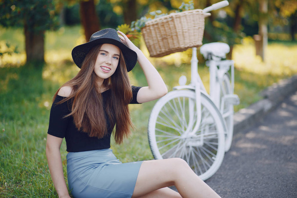 Girl with a bike - 写真・画像