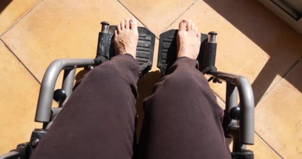 person sitting in medicine wheelchair - Footage, Video