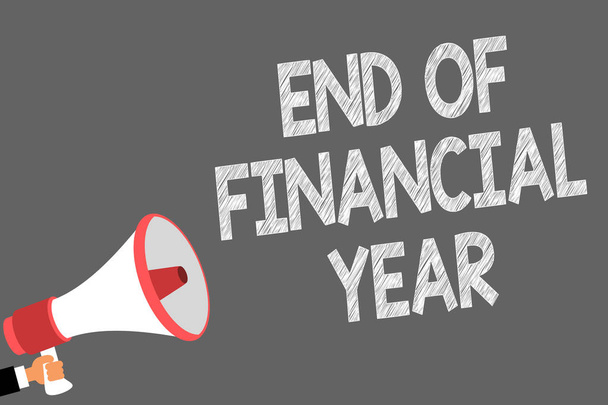 Text sign showing End Of Financial Year. Conceptual photo Revise and edit accounting sheets from previous year Symbols speaker alarming warning sound indications idea announcement - Photo, Image