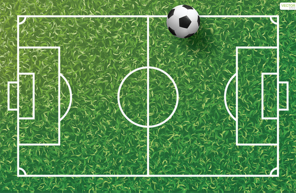 Футбольный мяч на зеленой траве футбольного поля с рисунком линии и текстурой травы. Векторная иллюстрация
. - Вектор,изображение