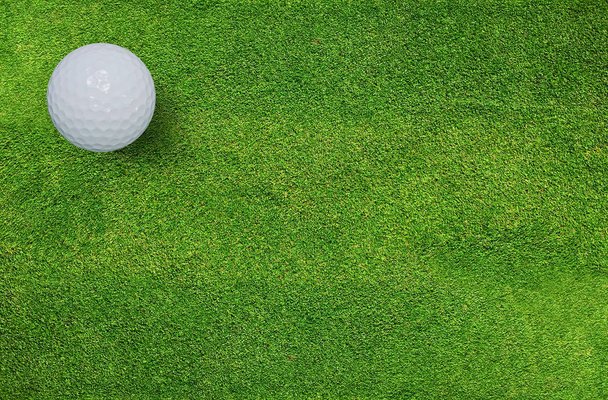 Golf ball on green grass of golf course. For golf sport background. - Photo, Image