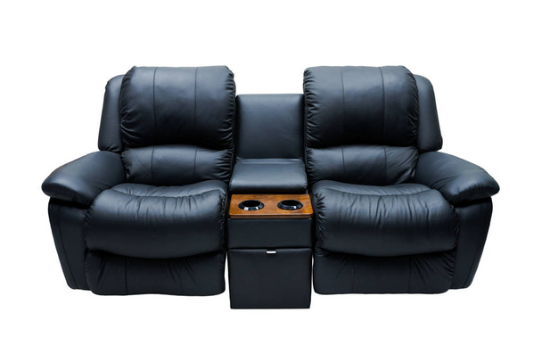 Canapé en cuir noir pour regarder des films isolés sur fond blanc
. - Photo, image
