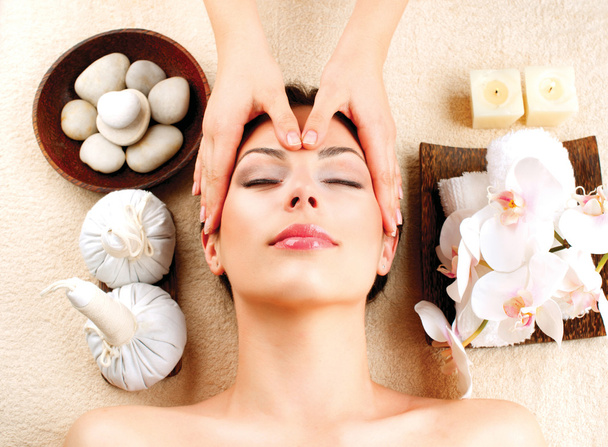 Spa Massage. Young Woman Getting Facial Massage - Valokuva, kuva