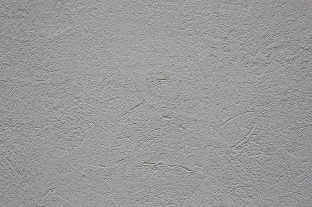 ruwe betonnen oppervlak met scheuren abstracte patroon textuur achtergrond - Foto, afbeelding
