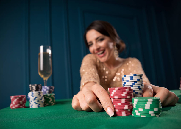 Young woman playing in the casino - Photo, image