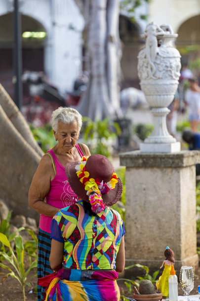 Havana, Cuba - Feb 11, 2018: Old Havana Cityscape with local People enjoying everyday life - Фото, зображення