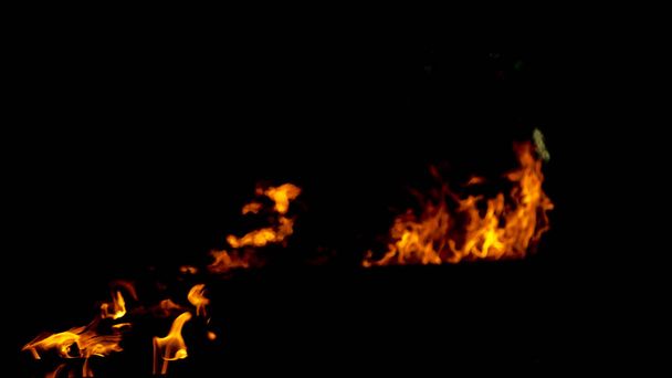 Firestorm texture on black background, shot of flying fire sparks - Photo, Image
