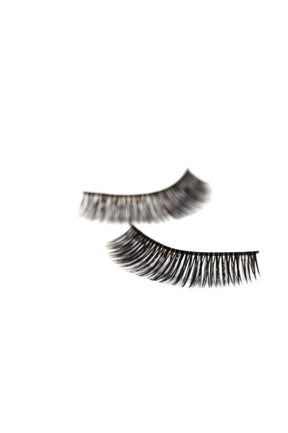 Closeup composition false Eyelashes style for woman eyes on white background with copy space - Photo, Image