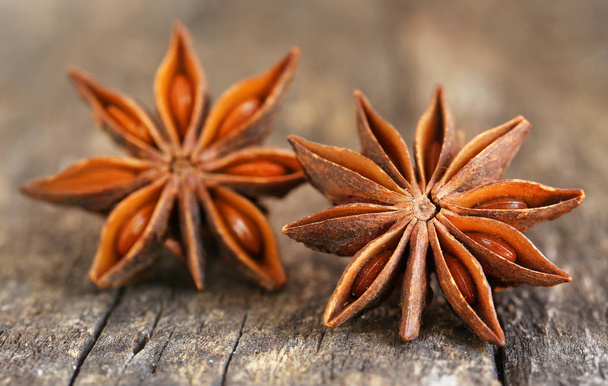 Aromatic star anise on timber surface - Photo, Image