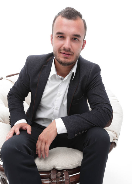 young businessman sitting in a comfortable chair - Foto, Imagen