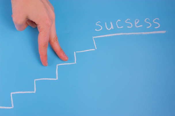 way to success consept. stairs on blue background - Фото, изображение