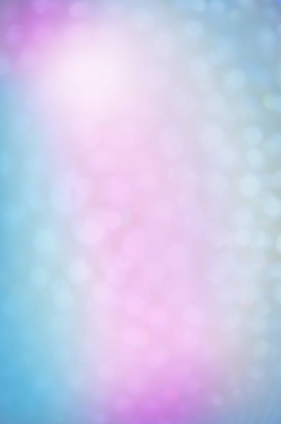 Blurred snow lights. Bokeh light festive backdrop. Abstract blurred pastel background - Photo, Image