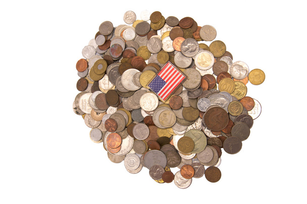 Amerikaanse vlag op een stapel van munten - Foto, afbeelding